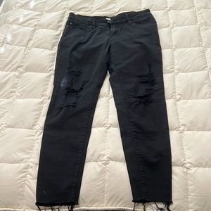 Black KanCan jeans. Ankle style with frayed hem.
